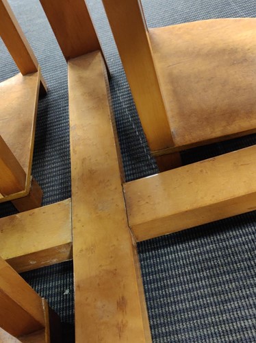 Lot 178 - An Art Deco birds eye maple nest of tables, in the manner of Epstein