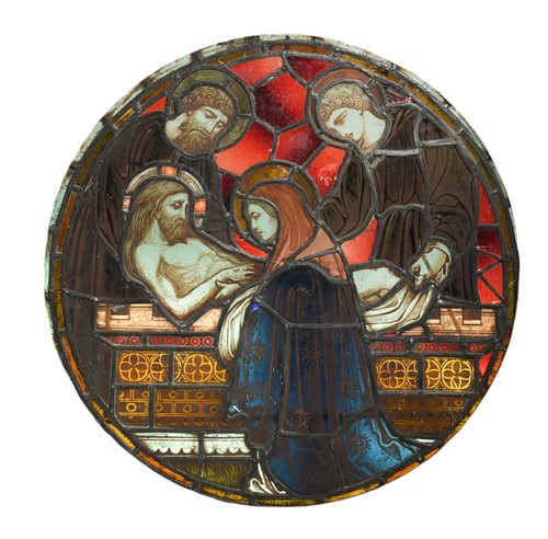 Lot 646 - A Pre-Raphaelite Period stained and leaded glass circular panel: The Entombment of Christ, 19th century