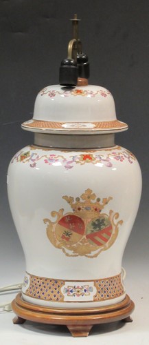 Lot 56 - A large ceramic baluster lamp enamelled with a...