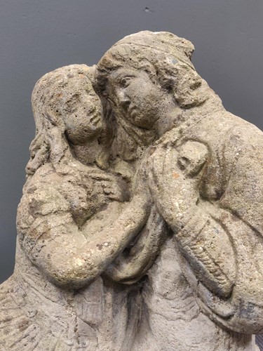 Lot 530 - A composite garden statue of a courting couple,...