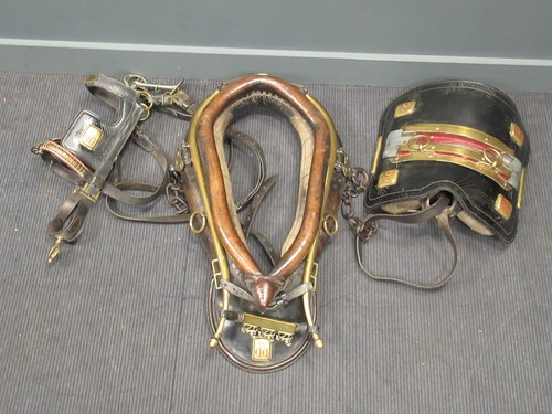 Lot 480 - A leather and brass horse saddle and hames by...