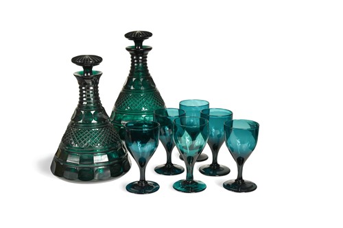Lot 701 - A suite of green glassware, 19th century