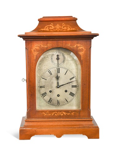 Lot 700 - A stained mahogany chiming mantel clock by Gustav Becker, early 20th century