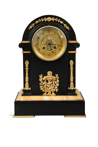 Lot 563 - A French black marble dome top mantel clock, 19th century