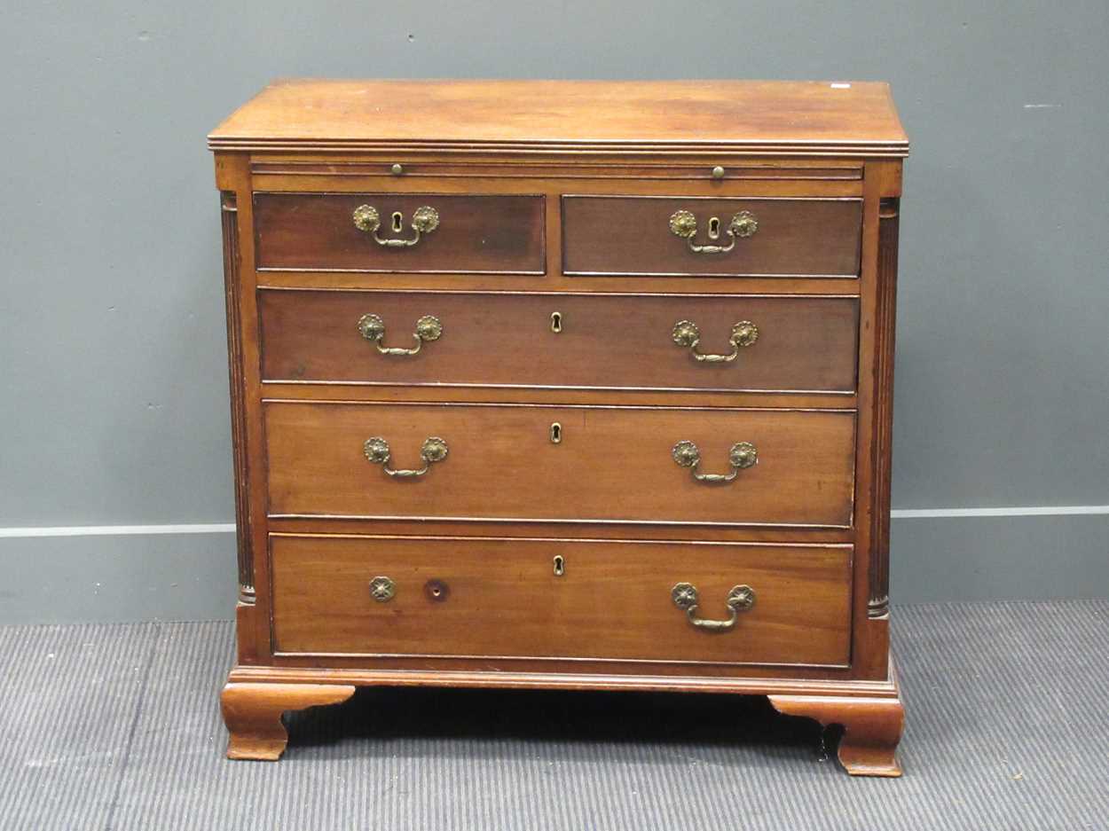 Lot 442 - A George III oak bachelor's chest of drawers...