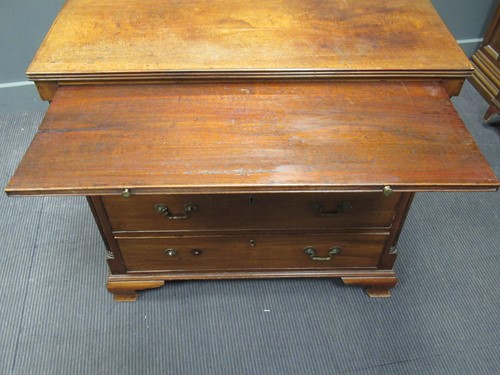 Lot 442 - A George III oak bachelor's chest of drawers...