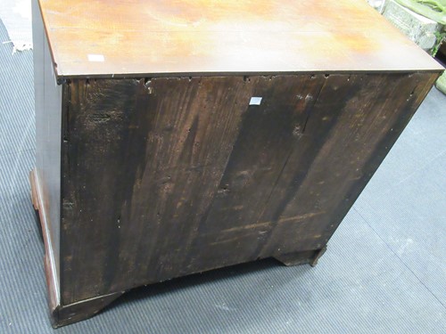 Lot 442 - A George III oak bachelor's chest of drawers...