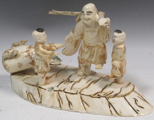Lot 3 - A faux ivory Okimono, 18cm high