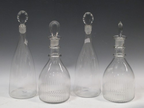 Lot 26 - Two pairs of 19th century glass decanters,...