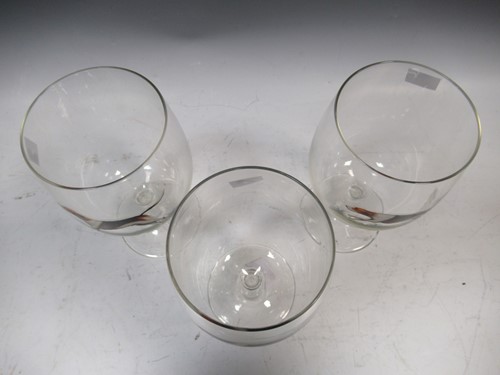 Lot 51 - Three large wine glasses hand painted with...
