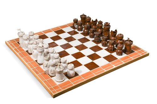 Lot 47 - A studio pottery chess set and board