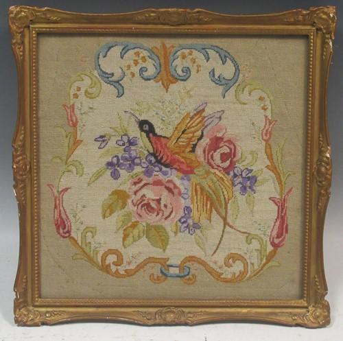 Lot 287 - A Victorian embroidery featuring a bird of...
