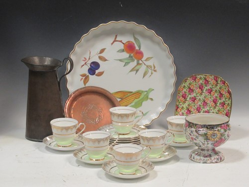 Lot 47 - A Hugh Wallis copper dish with wreath centre...