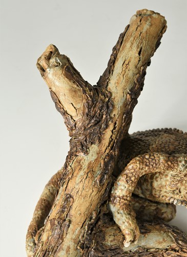 Lot 90 - David Cooke (1970-), a ceramic sculpture of a chameleon on a branch, 1996