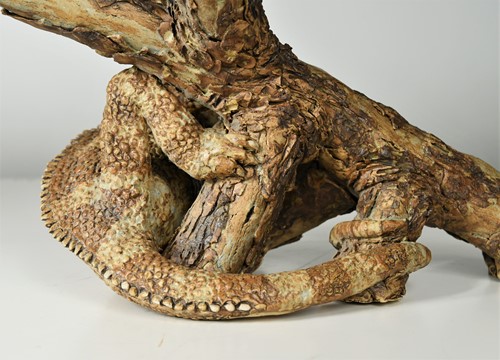 Lot 90 - David Cooke (1970-), a ceramic sculpture of a chameleon on a branch, 1996
