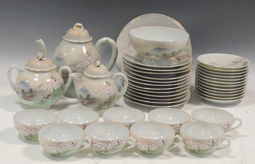 Lot 146 - A Japanese egg shell tea service