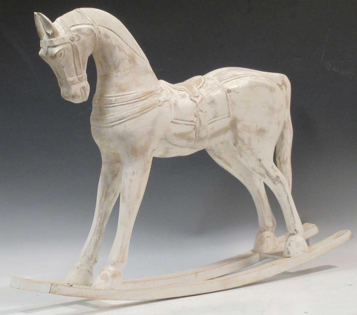 Lot 387 - A small white painted rocking horse, 59cm high