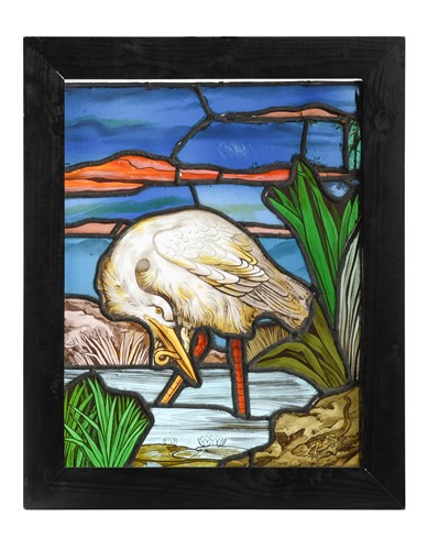Lot 645 - A leaded stained-glass panel depicting a wading heron, late 19th century