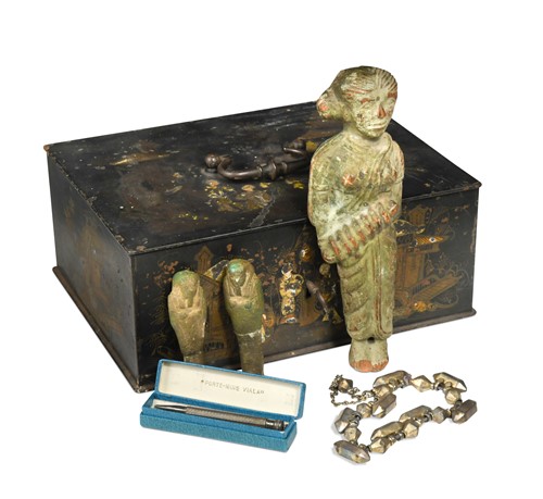 Lot 560 - A Japanned iron small strong box with collector's contents