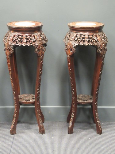 Lot 452 - A pair of Chinese marble inset hardwood urn...