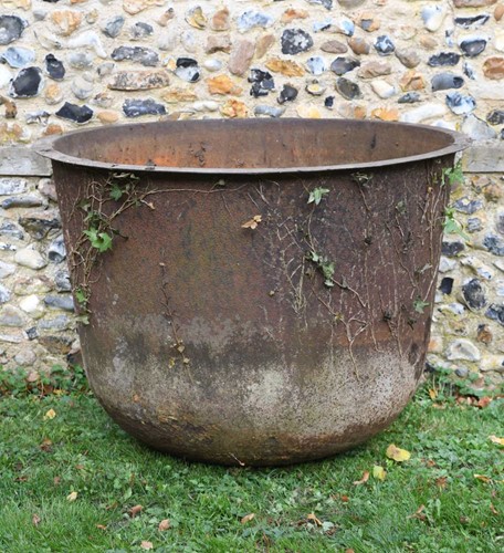 Lot 501 - A cast iron cauldron, 19th century, the bowl...