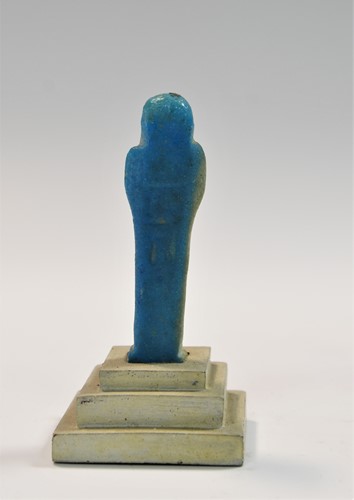 Lot 556 - A group of four Egyptian small bright blue shabti figures