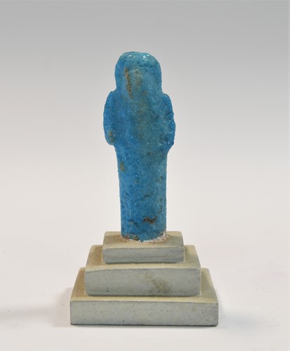 Lot 556 - A group of four Egyptian small bright blue shabti figures