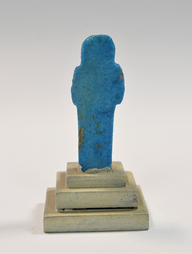 Lot 556 - A group of four Egyptian small bright blue shabti figures