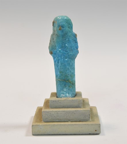Lot 556 - A group of four Egyptian small bright blue shabti figures