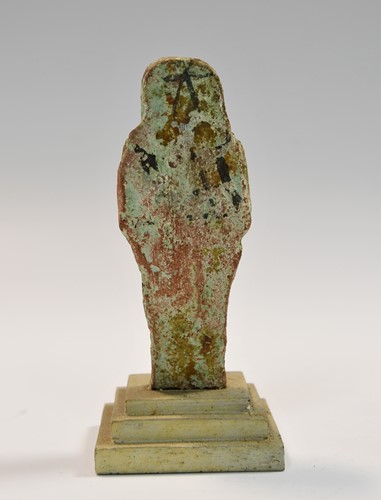 Lot 556 - A group of four Egyptian small bright blue shabti figures