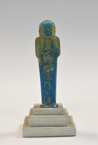 Lot 556 - A group of four Egyptian small bright blue shabti figures
