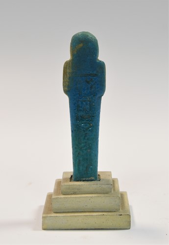 Lot 556 - A group of four Egyptian small bright blue shabti figures