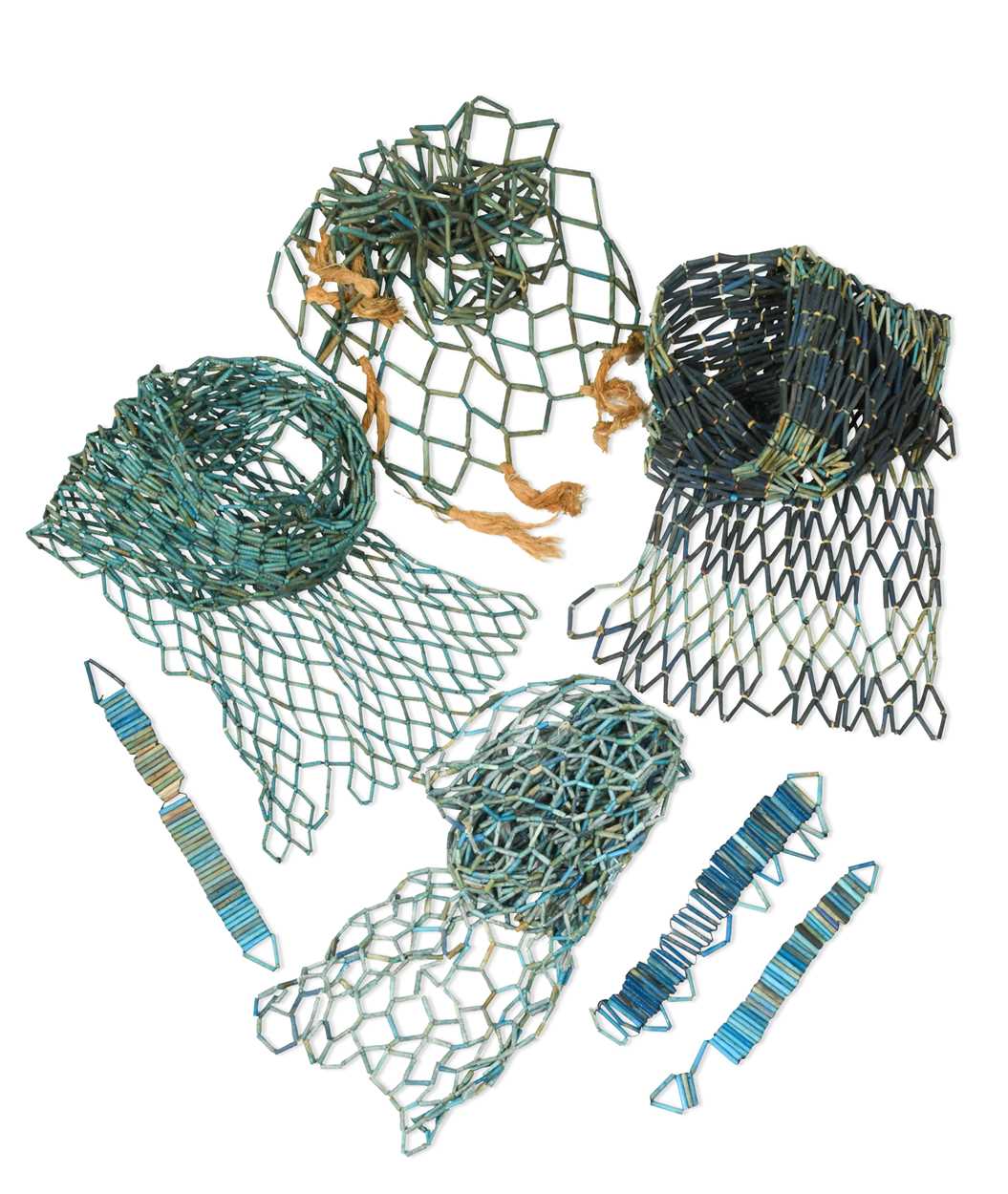 Lot 552 - Four Egyptian blue faience mummy bead net panels