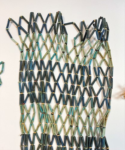 Lot 552 - Four Egyptian blue faience mummy bead net panels
