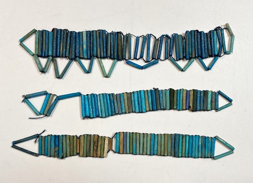 Lot 552 - Four Egyptian blue faience mummy bead net panels