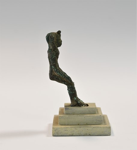 Lot 755 - An Egyptian bronze figure of Isis with Horus