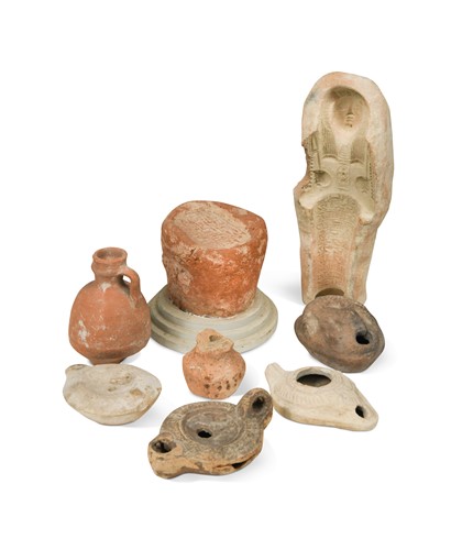 Lot 544 - An Egyptian pottery funerary cone