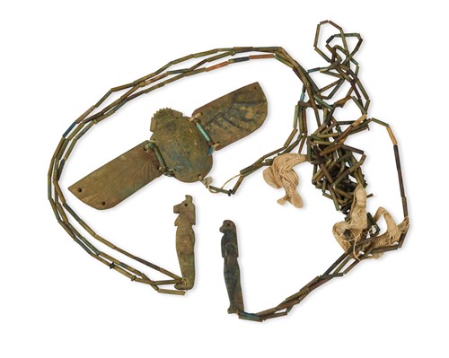 Lot 547 - An Egyptian glazed composition winged scarab applique necklace