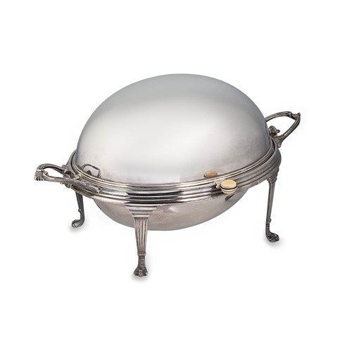 Lot 443 - A silver plated roll top entrée dish, together with a silver plated warming entrée dish