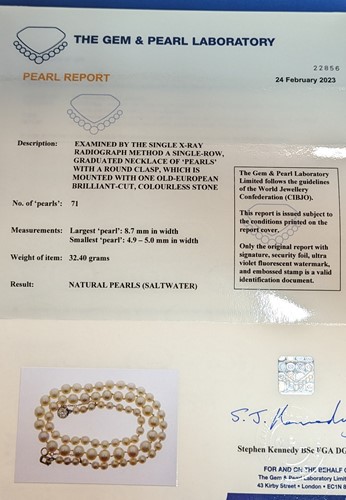 Lot 255 - A string of natural saltwater pearls with a diamond set clasp