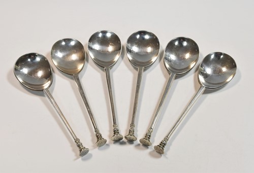 Lot 603 - Six George V silver seal top spoons