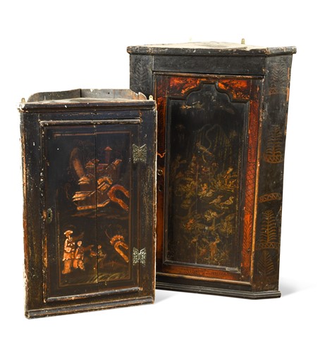Lot 312 - Two Georgian black lacquer corner cupboards