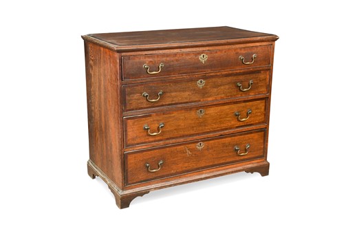 Lot 404 - A George III oak and mahogany chest