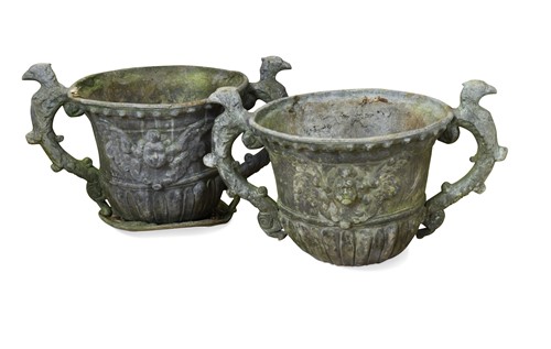 Lot 736 - A pair of two handled lead urns, 18th century