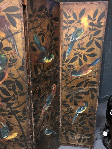 Lot 417 - A painted leather four-fold screen, 19th century