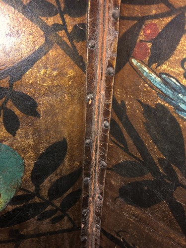 Lot 417 - A painted leather four-fold screen, 19th century