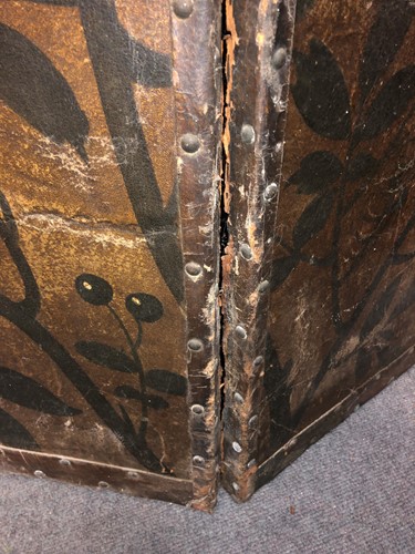 Lot 417 - A painted leather four-fold screen, 19th century