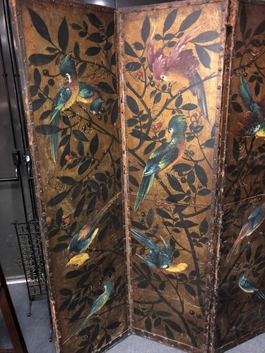 Lot 417 - A painted leather four-fold screen, 19th century