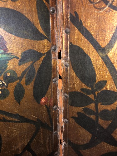 Lot 417 - A painted leather four-fold screen, 19th century