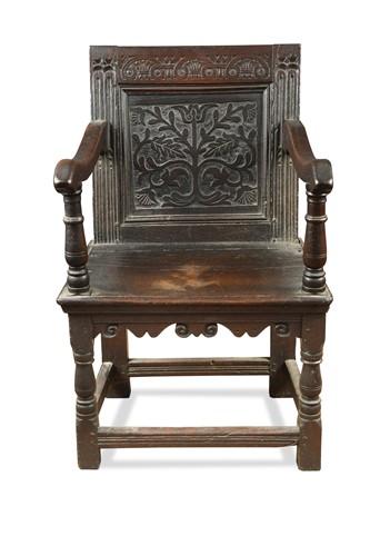 Lot 298 - A carved oak open armchair, 17th century